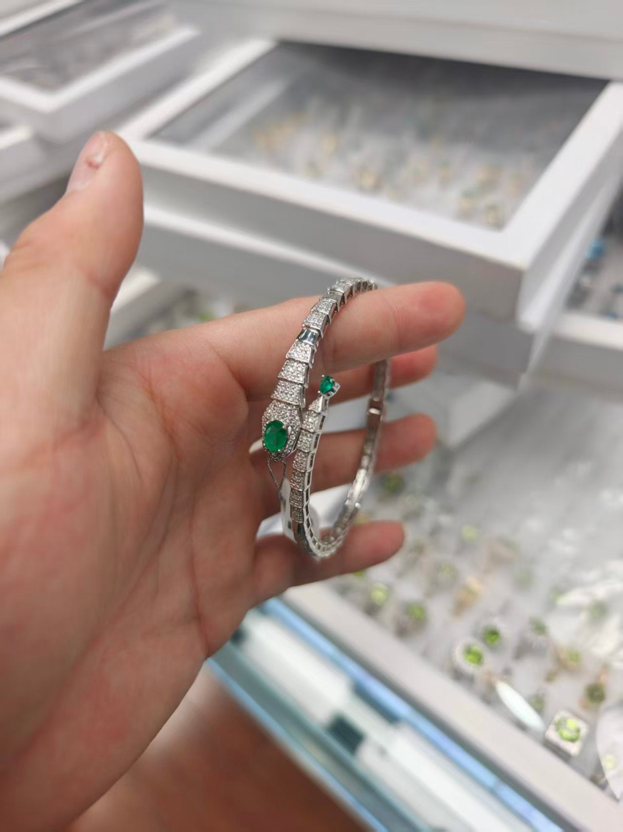Snake-shaped emerald bracelet